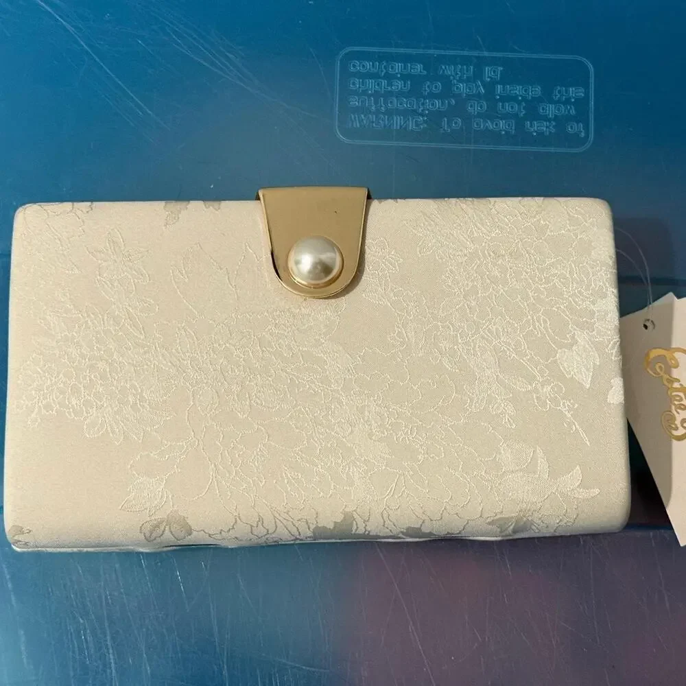 Estee & Lilly cream and white floral clutch bag with gold and pearl accents